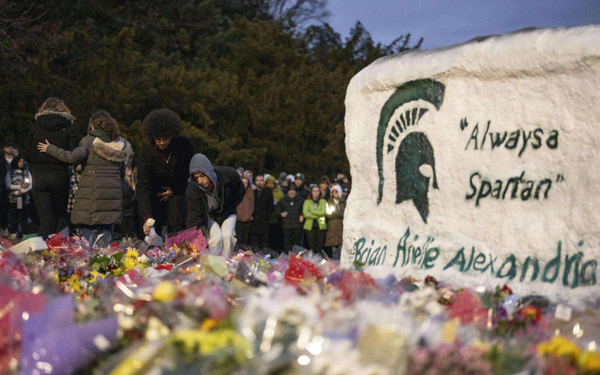 Thousands gathered at the Rock on Farm Lane on Wednesday, Feb. 16, 2023 to remember Brian Fraser, Alexandria Verner and Arielle Anderson, the three victims of Michigan State University’s mass shooting on Feb. 13. 