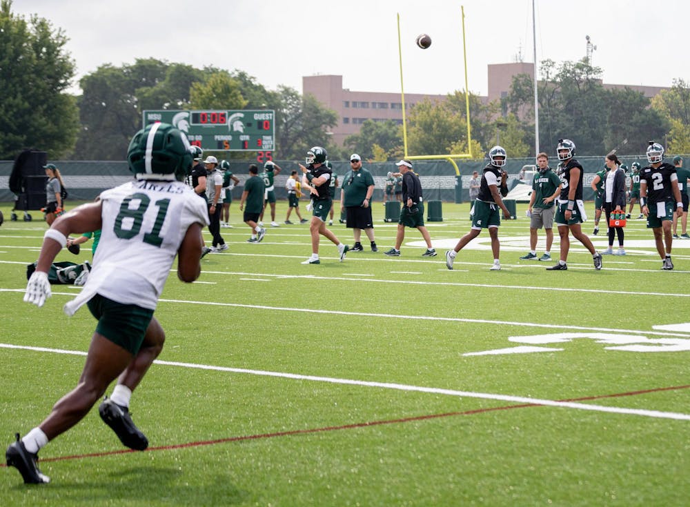 <p>Michigan State QB, Peyton Babbitt (23), throws a pass to WR, Colin Charles (81), during a practice at the MSU Duffy Daugherty practice fields in East Lansing, Mich., on Aug. 6, 2026.</p>