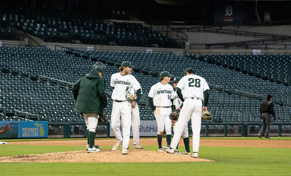 <p>The on-field team gathers at the mound during MSU&#x27;s matchup against Notre Dame at Comerica Park on April 26, 2022.</p>