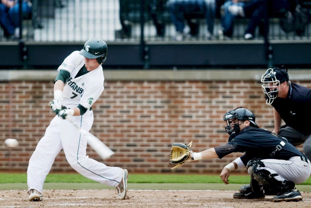 Junior third baseman Torsten Boss swings when up to bat on May 12. 2012 at McLane Baseball Stadium at Old College Field. The Spartans lost to the Hawkeyes 2-1. Samantha Radecki/The State News