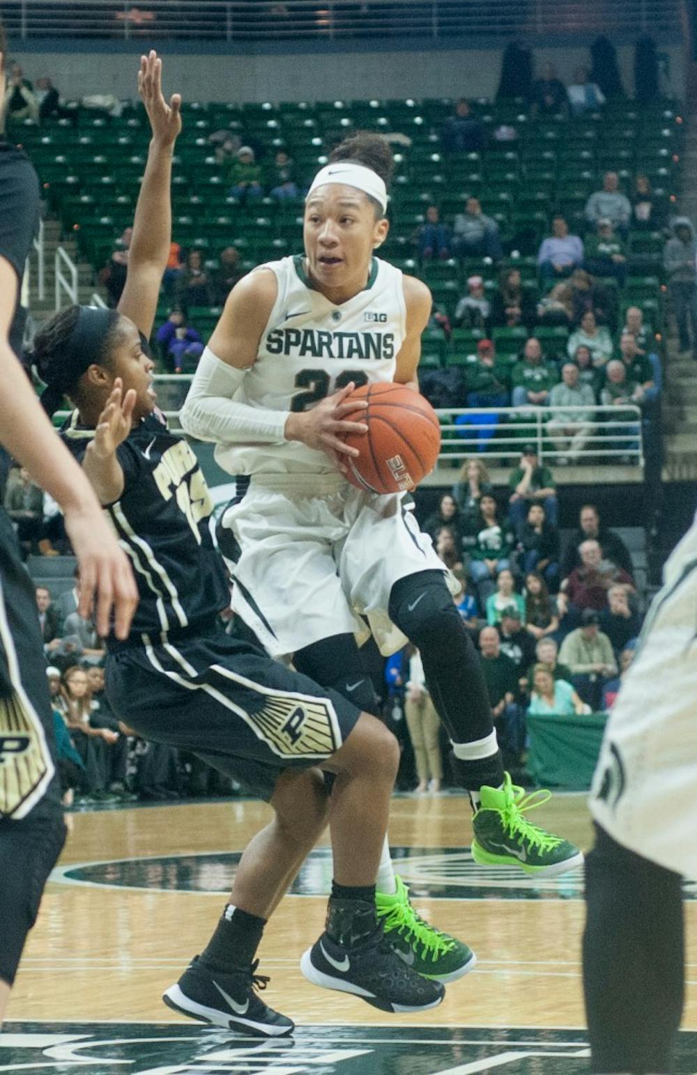 Junior forward Aerial Powers looks to shoot while Purdue guard April Wilson blocks during the first half of the game against Purdue on Jan. 27, 2016 at Breslin Center. The Spartans defeated the Boilermakers, 68-56.
