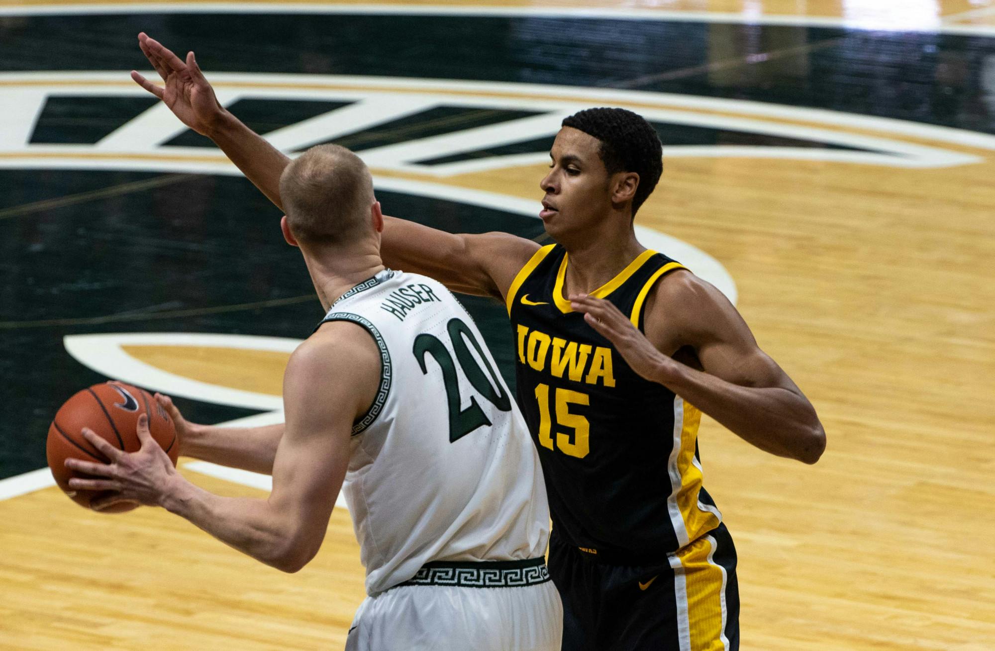 <p>Then-redshirt junior forward Joey Hauser (20) attempts to get around Iowa&#x27;s then-freshman Keegan Murray in the first half. The Spartans were crushed by the Hawkeyes, 88-58, on Feb. 13, 2021.</p>