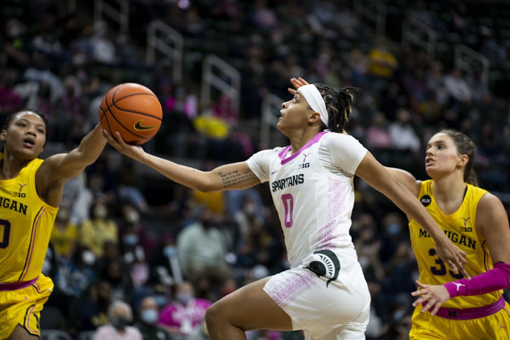 <p>Freshman guard DeeDee Hagemann (0) shoots the ball during the game against Michigan on Feb. 10, 2022, at the Breslin Center. The Spartans defeated the Wolverines 63-57.</p>