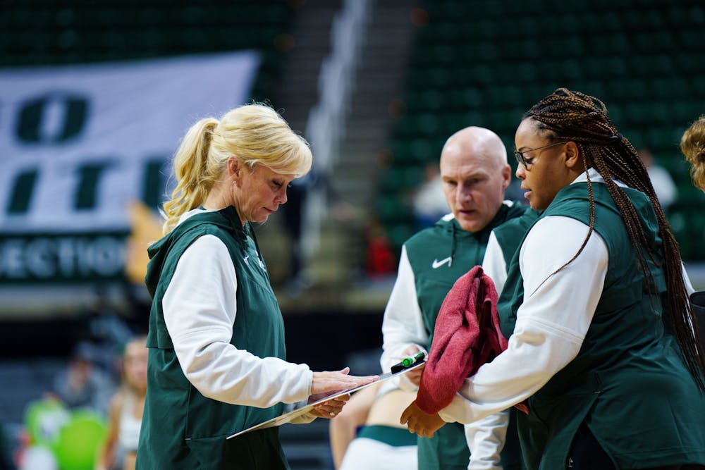 <p>Michigan State Women's Basketball head coach Suzy Merchant draws up a play during a timeout of a game against Georgia Tech, held at the Breslin Center on Dec. 1, 2022. The Spartans fell to the Yellow Jackets 63-66.&nbsp;</p>