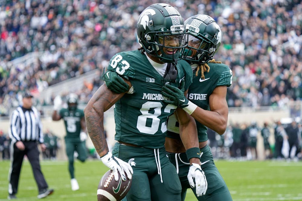 <p>Spartan Senior Wide Receiver Montorie Foster Jr. (83) and Sophomore Wider Receiver Tyrell Henry (2) celebrate Foster Jr.'s touchdown against Nebraska at Spartan Stadium on Nov. 4, 2023. The Michigan State Spartans would go on to win the game 20-17.</p>