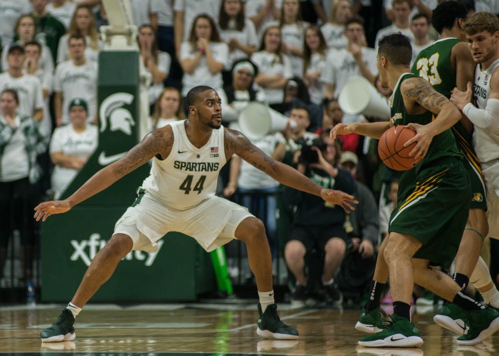 Junior forward Nick Ward (44) blocks a Northern Michigan player during the game against Northern Michigan at Breslin Center on Oct. 30, 2018. The Spartans defeated the Wildcats, 93-47.