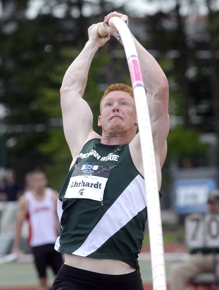 <p>Sophomore Tim Ehrhardt hits the pit and begins his jump for the bar during the men's pole vault competition at the Big Ten Conference Championships May 17th, 2015 at Ralph Young Field. Wyatt Giangrande/ State News</p>