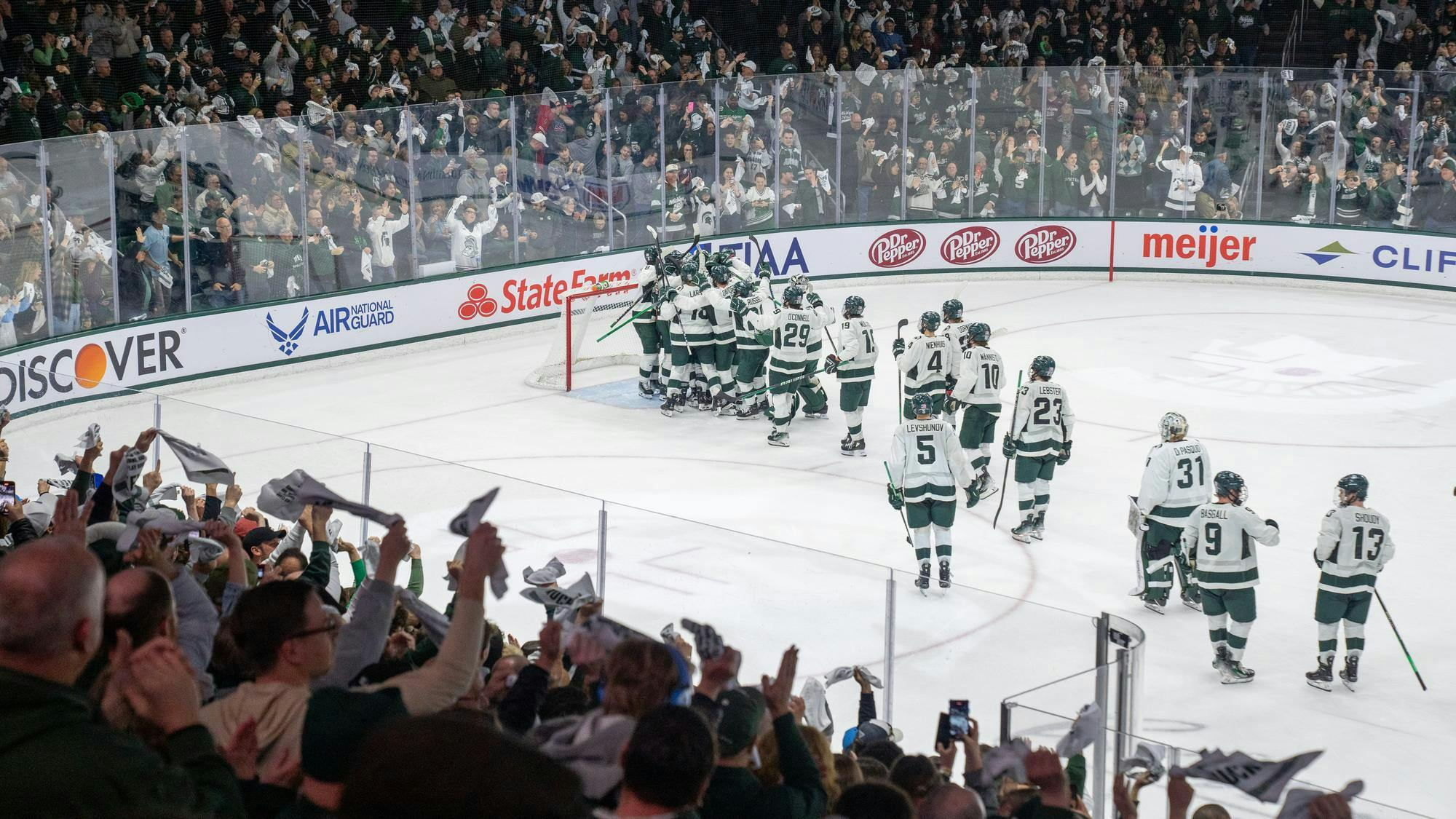 <p>Spartan players celebrating their victory against Ohio State University at Munn Ice Arena on March 16, 2024. Michigan State University won the game 2-1, advancing them to the final round of the Big Ten Tournament.</p>