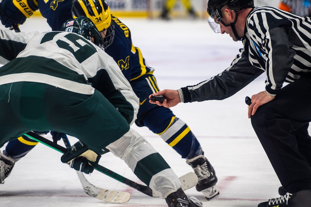 <p>Junior right-wing Nicolas Müller (19) faces off against Michigan&#x27;s Thomas Bordeleau in the second period. The Spartans battled the Wolverines and lost, 7-3, at Duel of the D at Little Caesars Arena in Detroit on Feb. 12, 2022. </p>