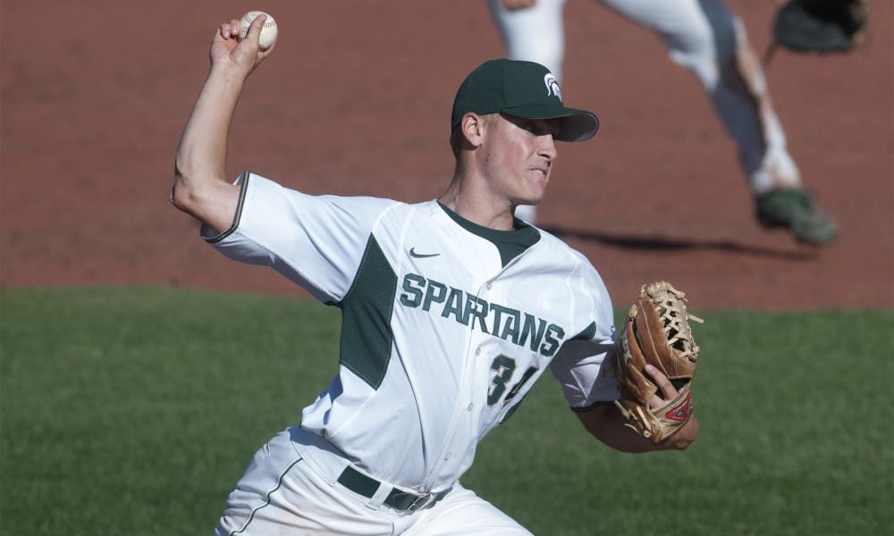<p>Junior pitcher Joe Mockbee winds up during the baseball exhibition game against Air Force on Sept. 19, 2015 at McLane Stadium. MSU baseball season begins in February. Jack Stephan/The State News</p>