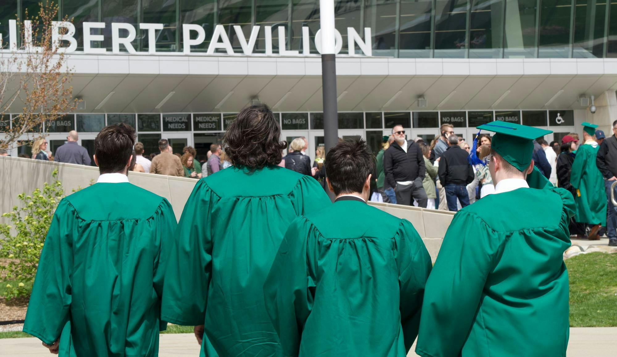 Michigan State University students gather outside the Breslin Center after spring convocation on April 26, 2024. 