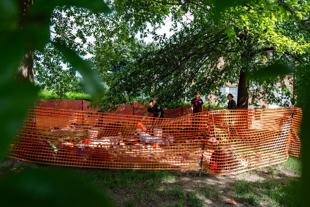 <p>Members of the Campus Archaeology Program work on the old observatory site in East Lansing, Mich., on June 15, 2026.</p>