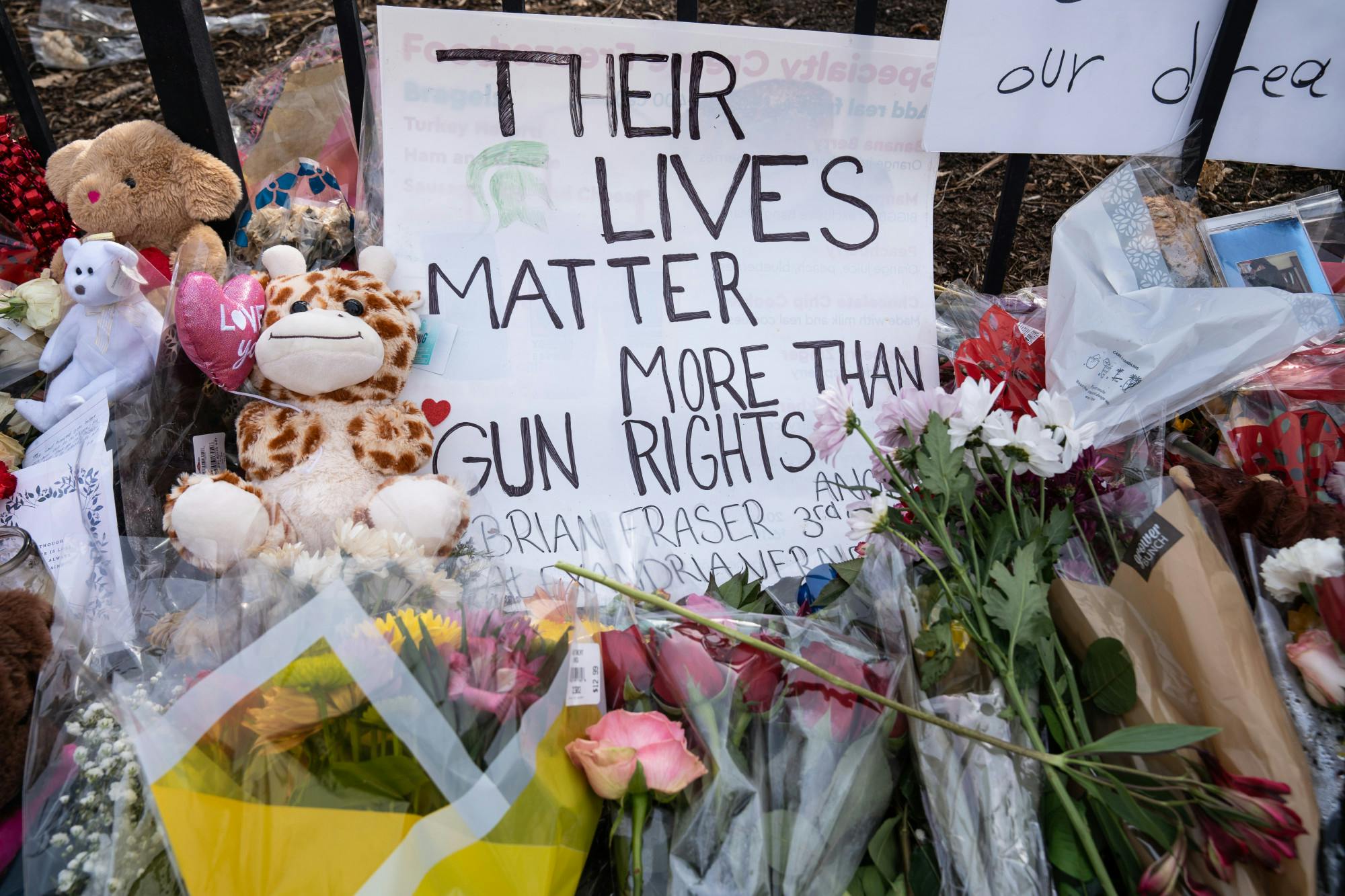 A vigil sits outside the fence of the Union on Feb. 20, 2023. The day before, 'Spartan Sunday' was held on campus where students and the community came together to take back the campus after a mass shooting took place on Feb. 13, 2023.