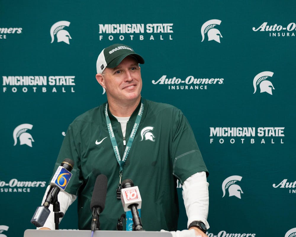 <p>Michigan State football HC, Pat Fitzgerald, answers questions during a press conference in the Skandalaris Football building in East Lansing, Mich., on Aug. 6, 2026.</p>