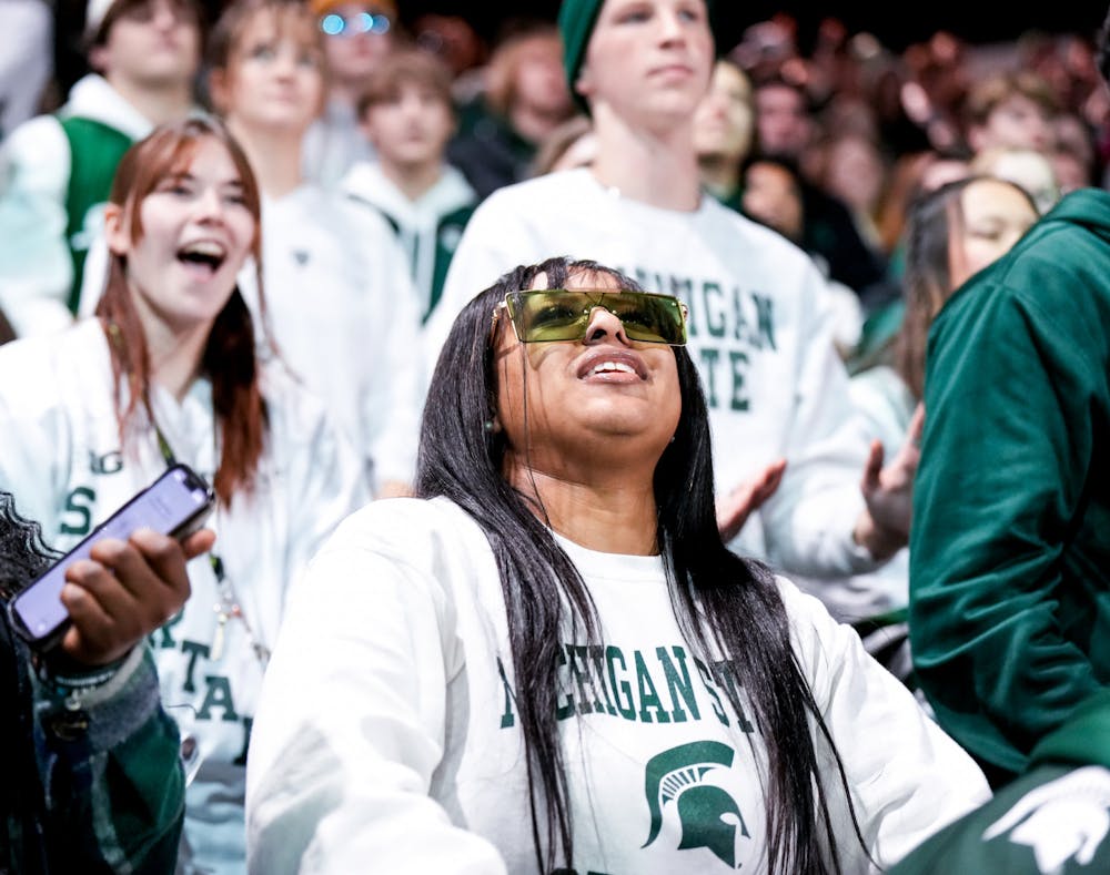 <p>An MSU fan cheers on the men's hockey team during a game against Notre Dame at Munn Ice Arena on Feb. 3, 2023. The Spartans defeated the Fighting Irish 3-0.</p>