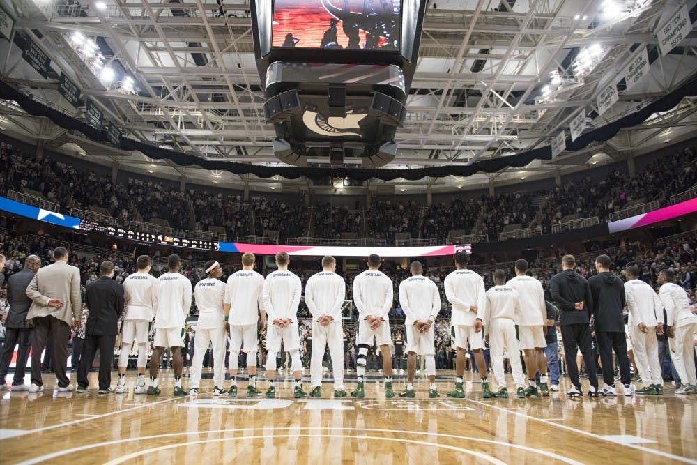 The Spartans stand during the national anthem before the men's basketball game against Purdue on Jan. 24, 2017 at Breslin Center. The Spartans were defeated by the  Boilermakers, 84-73. 