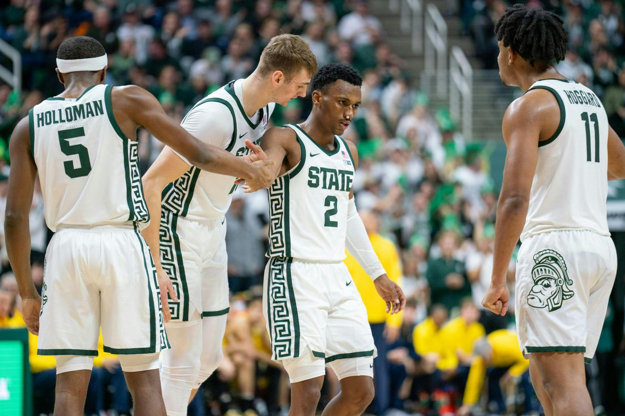 <p>Graduate Student guard Tyson Walker (2) celebrating a made layup attempt during a game against the University of Michigan at the Breslin Student Events Center on Jan. 30, 2024.</p>