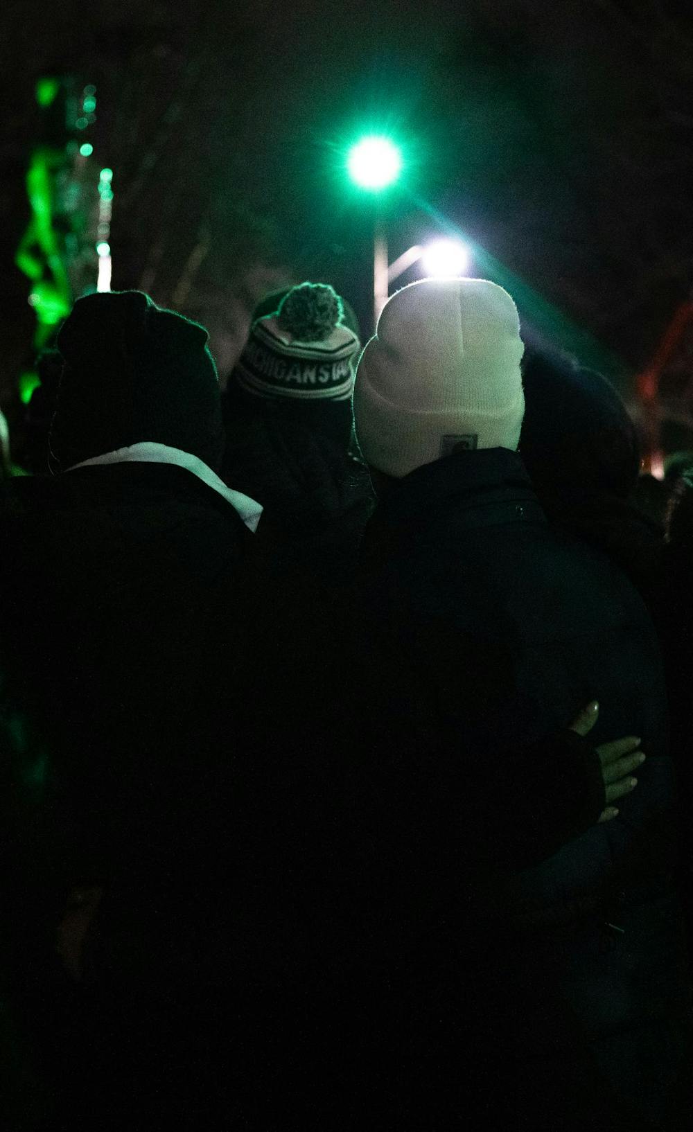 <p>MSU students hold on to each other in front of the Spartan Statue on Feb. 13, 2024. One year after the Michigan State University campus shooting, a remembrance ceremony was held to remember and reflect on the tragedy.</p>