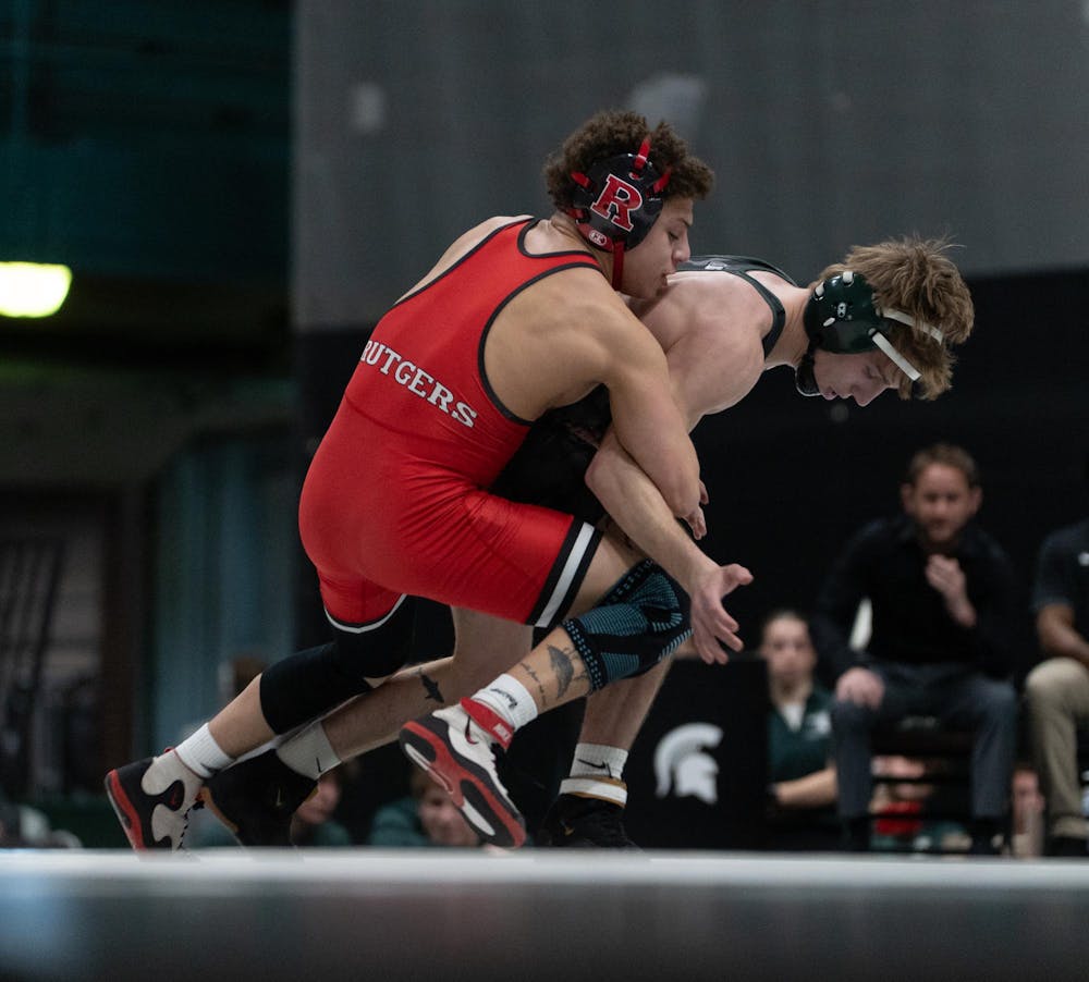 <p>Redshirt junior Nick Corday battles a Rutgers opponent during the dual match at Jenison Field house on Feb. 13, 2026.</p>