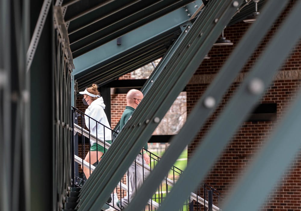 Fans return to the stands for the bottom of the eighth inning after the rain delay. The Spartans excelled against the Nittany Lions and won 7-4 at McLane Baseball Field on April 9, 2021.
