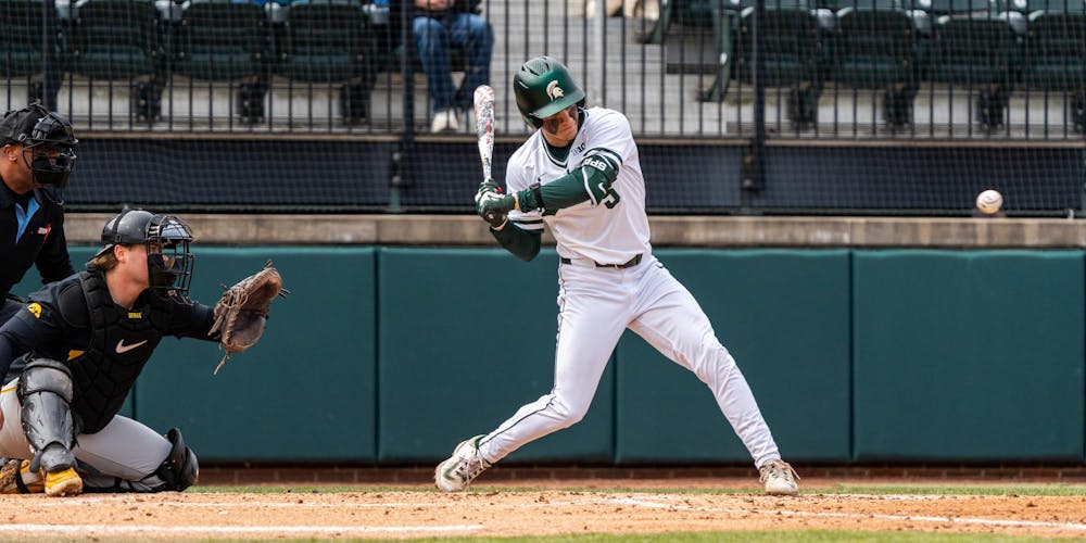 MSU Jr. OF, Trent Rice (5) gets ready to hit the incoming ball in the Jeff Ishbia Field in McLane Stadium in East Lansing, MI on March 21, 2026.