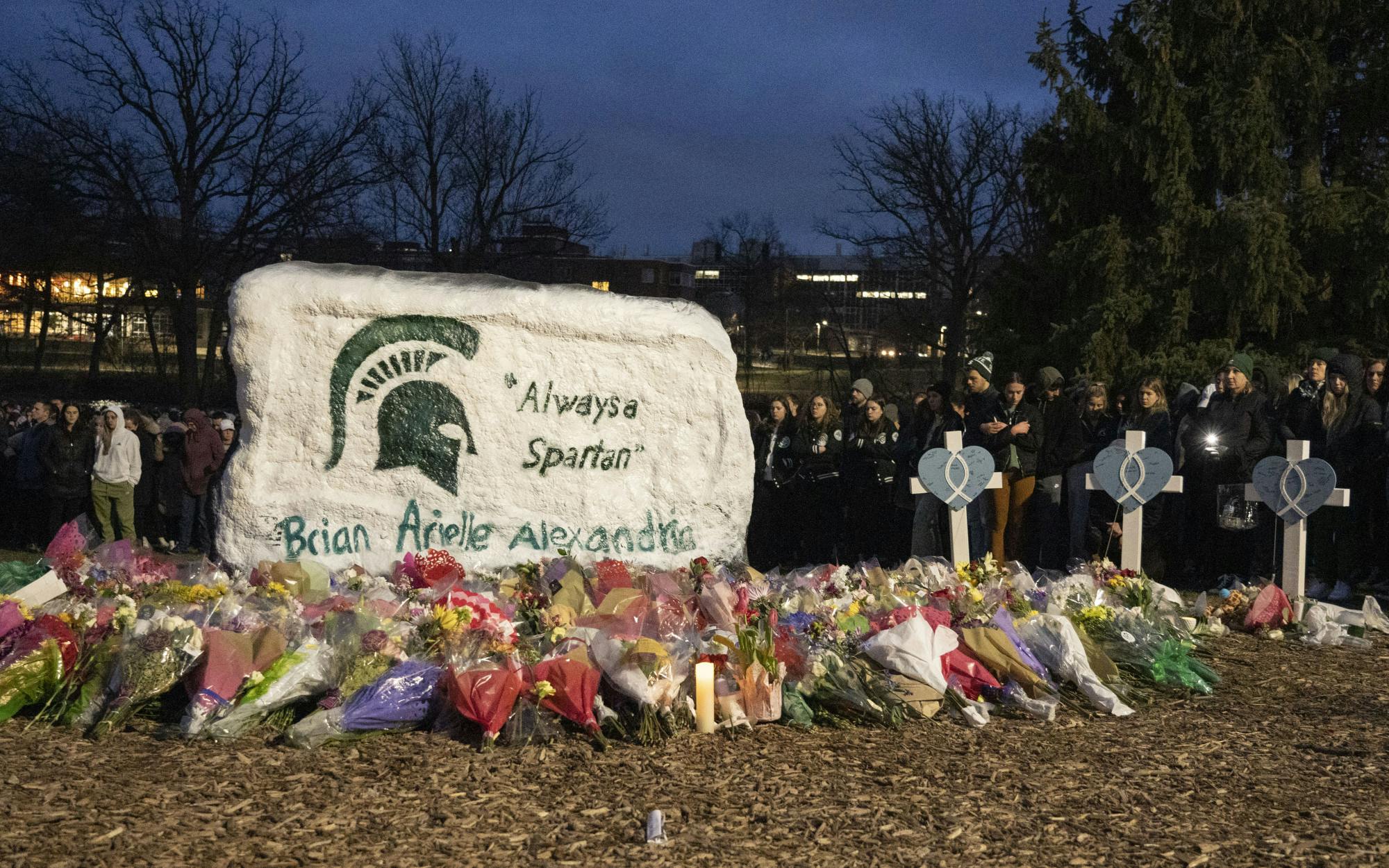 Thousands gathered at the Rock on Farm Lane on Wednesday, Feb. 16, 2023 to remember Brian Fraser, Alexandria Verner and Arielle Anderson, the three victims of Michigan State University’s mass shooting on Feb. 13. 
