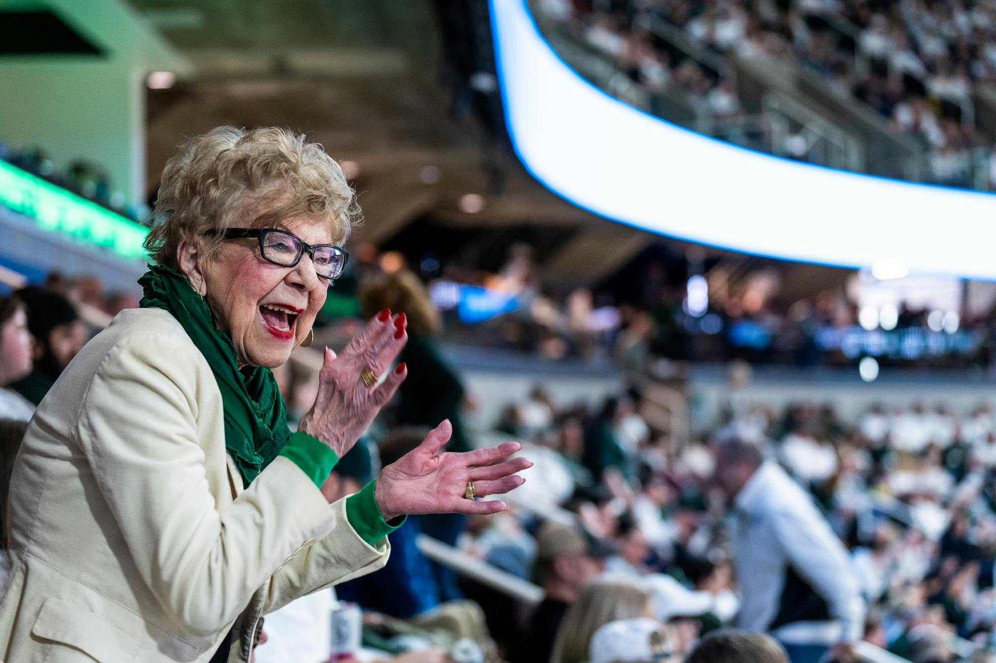 <p>Michigan State superfan Jan Alleman celebrates a Spartan basket against Oregon at the Breslin Center on Saturday, Feb. 8, 2025</p>