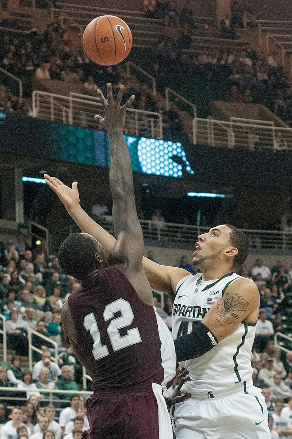 	<p>Freshman guard Denzel Valentine shoots the ball as Texas Southern&#8217;s forward Kyrie Sutton tries to block it Nov. 18, 2012, at Breslin Center. Valentine scored eight points for the Spartans helping them beat the Tigers 69-41. Natalie Kolb/The State News</p>