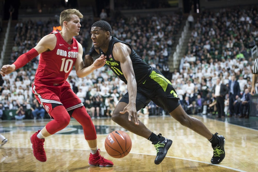 <p>Then-freshman forward Aaron Henry (11) drives to the net during the men's basketball game against Ohio State on Feb.17, 2019, at Breslin Center.</p>