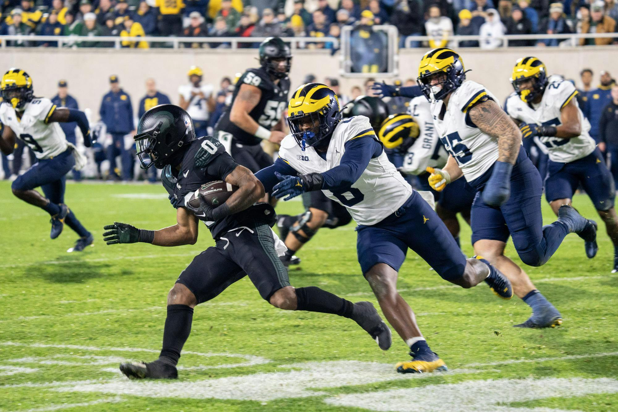 <p>MSU senior wide receiver Alante Brown (0) returns a punt against University of Michigan at Spartan Stadium on Oct. 21, 2023. Michigan State would go on to lose 49-0 in regulation.</p>