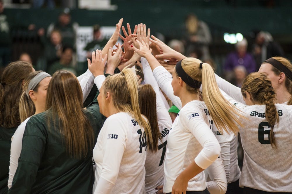 The Spartan volleyball team huddles up after winning the first round of the NCAA Championship against Fairfield University on Dec. 2, 2016 at Jenison Field House. The Spartans defeated the Stags, 3-0.