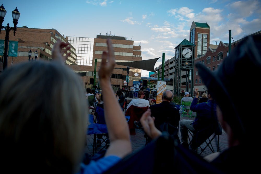 Dozens of local community members enjoyed live music during the 2019 Summer Concert Series on Friday, August 23, 2019, in downtown East Lansing. (Sylvia Jarrus/The State News)