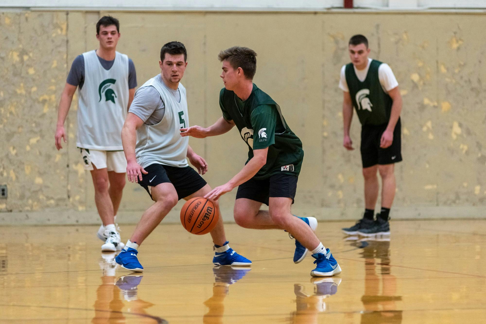 <p>MSU students compete in an intramural basketball game at IM Sports West on February 10, 2020.</p>