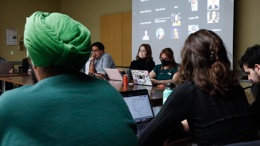 <p>Michigan State ASMSU current president and moderator Georgia Frost continues discussion of future budget plans. The ASMSU Elections were held in the Student Services Building Conference Room, on April 20, 2022, with Michigan State Junior Jordan Kovach becoming the next ASMSU President.</p>
