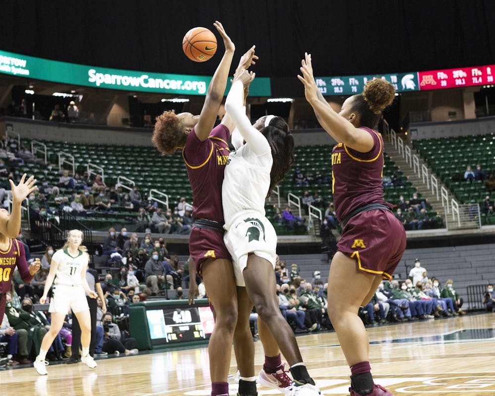 <p>Michigan State and Minnesota collide as the ball comes down on Jan. 23, 2022.</p>