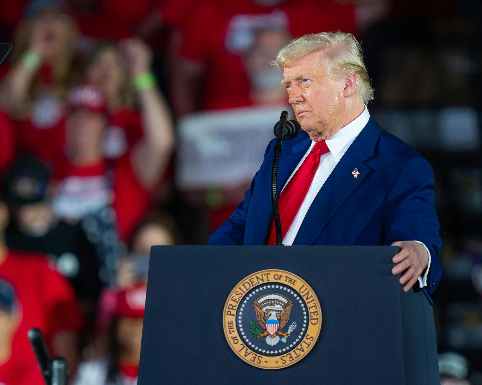 President Donald Trump marks his first 100 days in office with a rally at Macomb Community College in Warren, Michigan on April 29, 2025. 