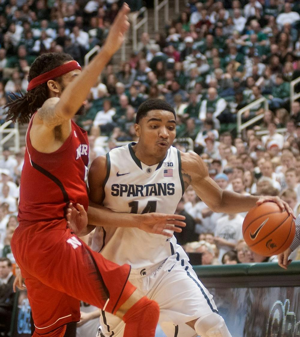 	<p>Nebraska forward Terran Petteway guards sophomore guard Gary Harris on Feb. 16, 2014, at Breslin Center. Harris scored 18 points during the game. Betsy Agosta/The State News</p>