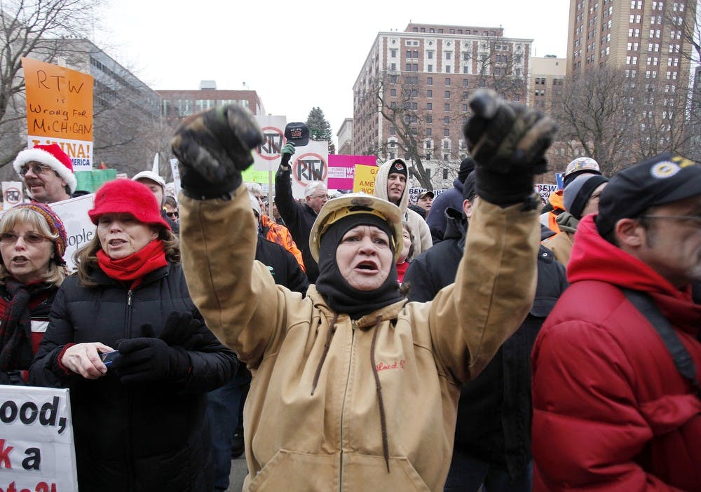 	<p>Sue Jantschak, a union carpenter, from Milan chants as the protest against right-to-work legislation continues outside the Capitol in Lansing, Michigan, Tuesday, Dec. 11, 2012. Andre J. Jackson/Detroit Free Press/MCT</p>