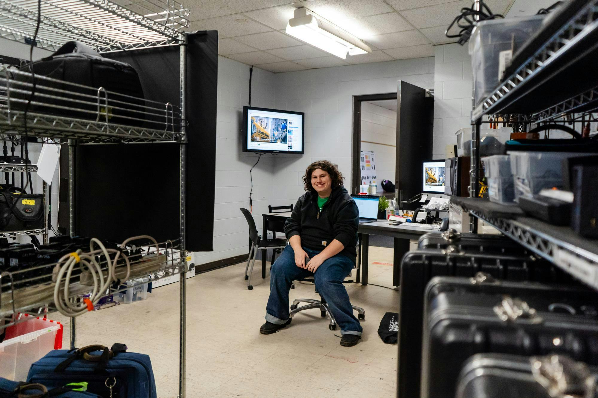 <p>Portrait of Sophomore Aiden Myerson at the SA desk (DMAT Equipment Checkout) at the Communication Arts and Sciences building on Dec. 6, 2024. </p>