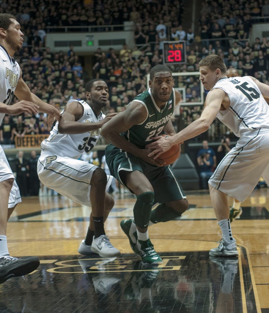 	<p>Sophomore guard Branden Dawson fights for posession of the ball during the game against Purdue on Feb. 9, 2013, at Mackey Arena in West Lafayette, Ind. Dawson was the leading scorer for <span class="caps">MSU</span> with a career high 20 points, helping the Spartans beat the Boilermakers, 78-65. Natalie Kolb/The State News</p>