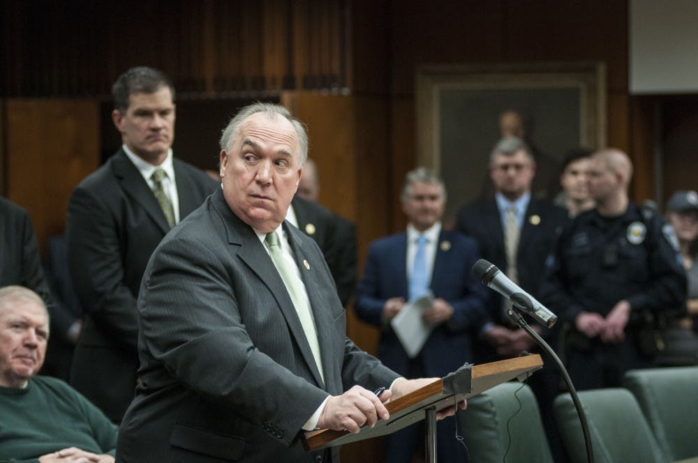 Newly appointed interim president John Engler addresses the media on Jan. 31, 2018, at Hannah Administration Building. (C.J. Weiss | The State News)