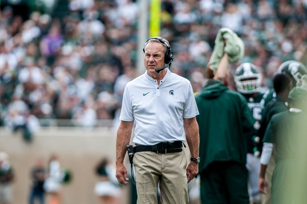 Head coach Mark Dantonio watches on from the sidelines during the game against Northwestern on Oct. 6, 2018 at Spartan Stadium. The Spartans fell to the Wildcats, 29-19.