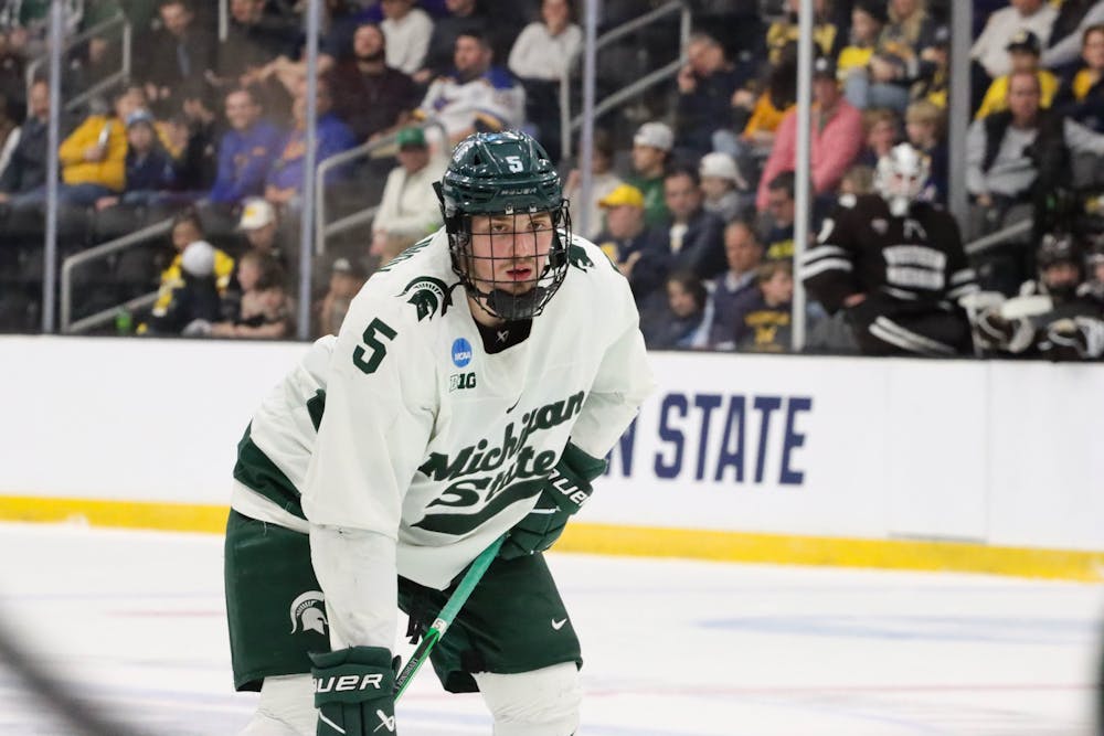 <p>Freshman defenseman Artyom Levshunov prepares for a Spartans vs. Broncos face off to start the period in a game against Western Michigan at Centene Ice Center on March 29, 2024.</p>