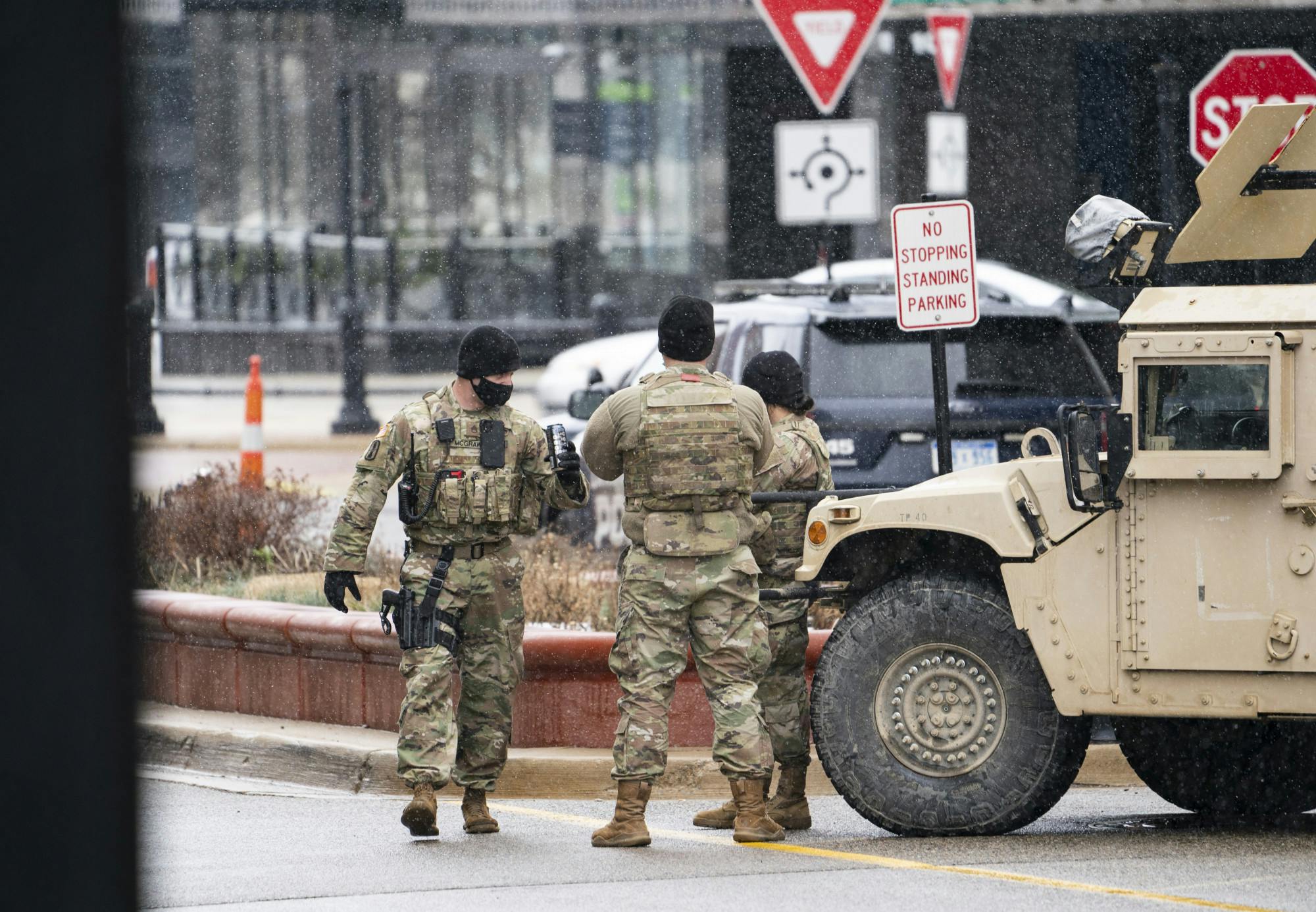 <p>National Guard members stand beside a Humvee during a protest against the inauguration of President-elect Joe Biden on Jan. 17, 2020. The FBI warned local law enforcement agencies about the possibility of armed protests and violence at all 50 state capitols earlier in January resulting in increased security at the state capitol.<br/><br/></p>