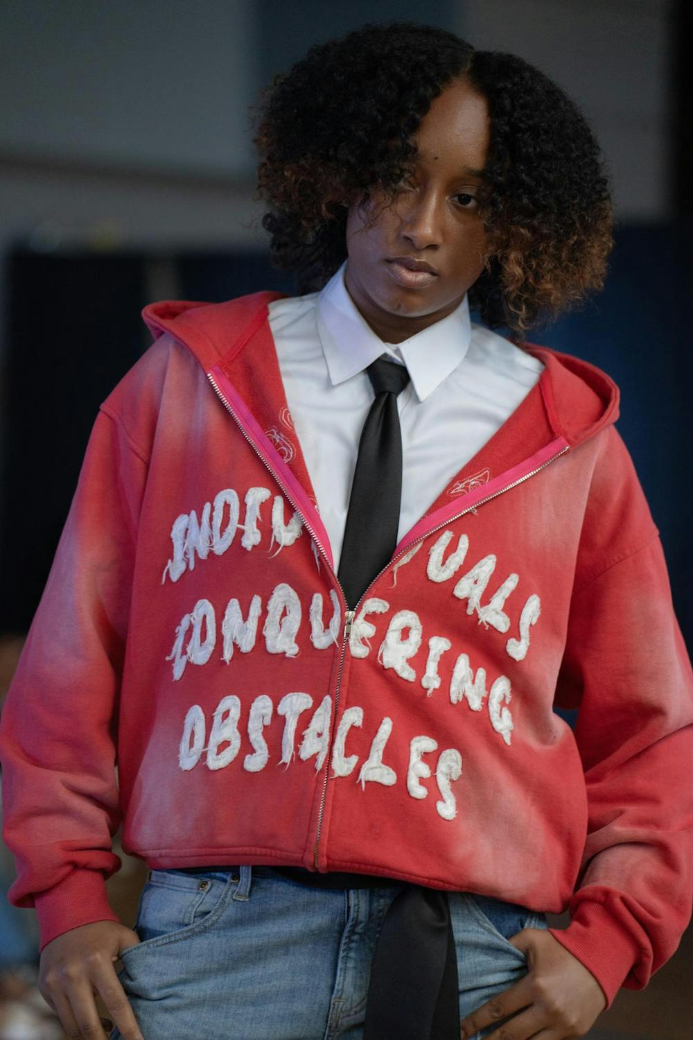 <p>Freshman Reagan Horne models for student clothing brand, R.I.C.O Apparel on the runway of Crowd Magazine fashion show on April 27.</p>