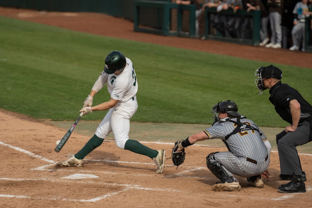 <p>Senior Zach Iverson bats a single during the game against Western Michigan on April 13, 2022. MSU would end up losing 18-7. </p>