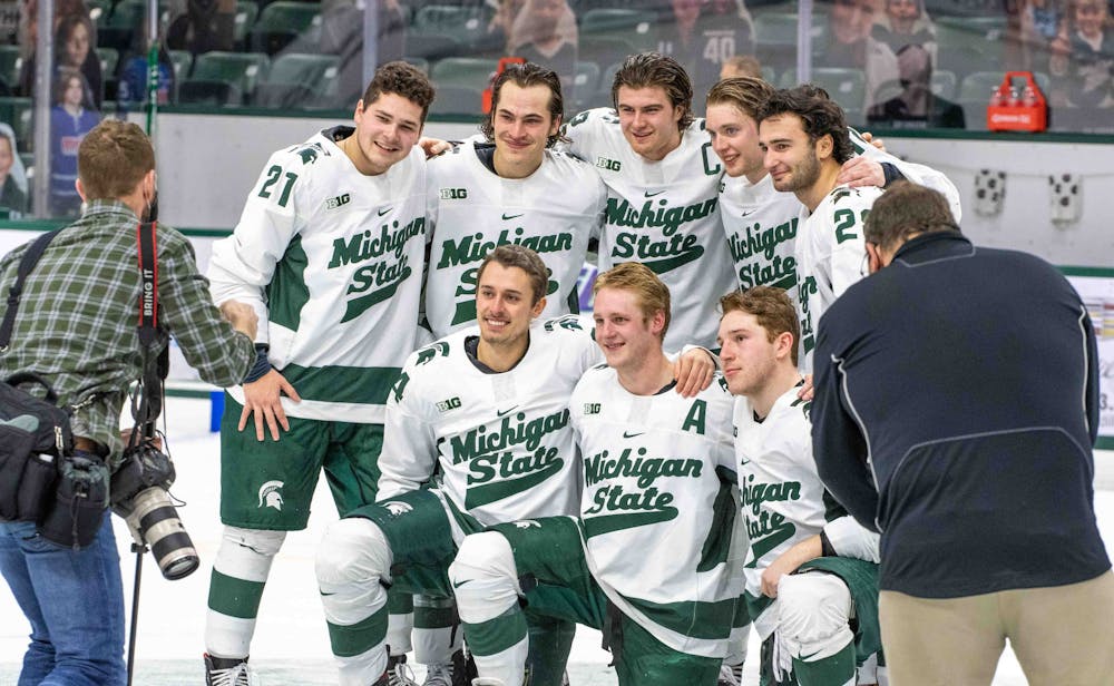 Michigan State hockey seniors pose for a photo on senior night after their loss to Notre Dame. The Fighting Irish shutout the Spartans 2-0 on Feb. 27, 2021.
