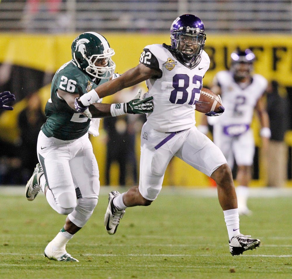 	<p>Texas Christian wide receiver Josh Boyce runs with a 59-yard reception in the second quarter against redshirt freshman safety RJ Williamson in the Buffalo Wild Wings Bowl on Dec. 29, 2012, at Sun Devil Stadium in Tempe, Arizona. Ron T. Ennis/Fort Worth Star-Telegram/MCT</p>