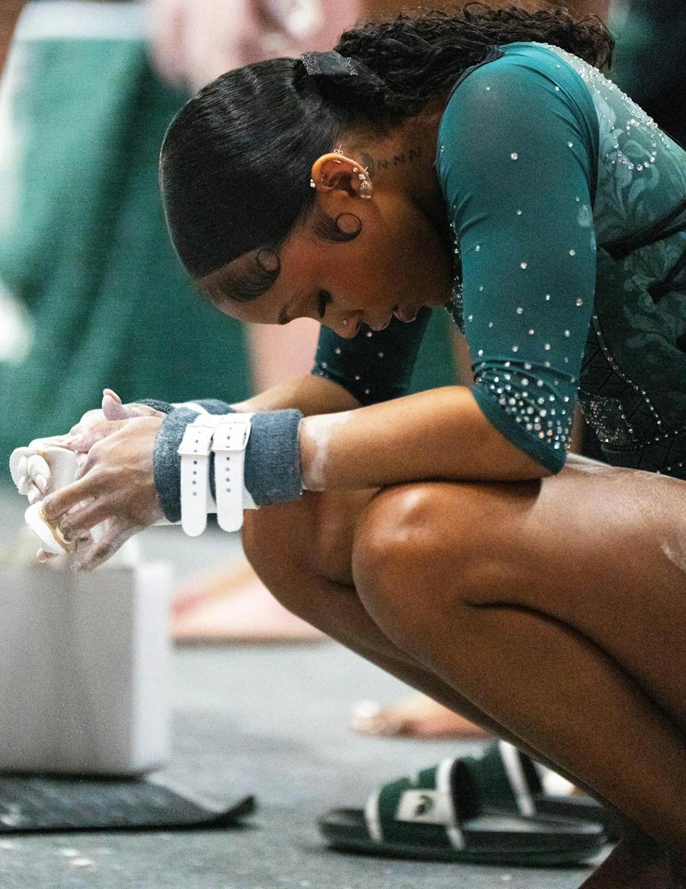 MSU senior Nikki Smith quiets her mind during the MSU v WMU v UMD at Jenison Field House in East Lansing, on Feb. 15th, 2026.