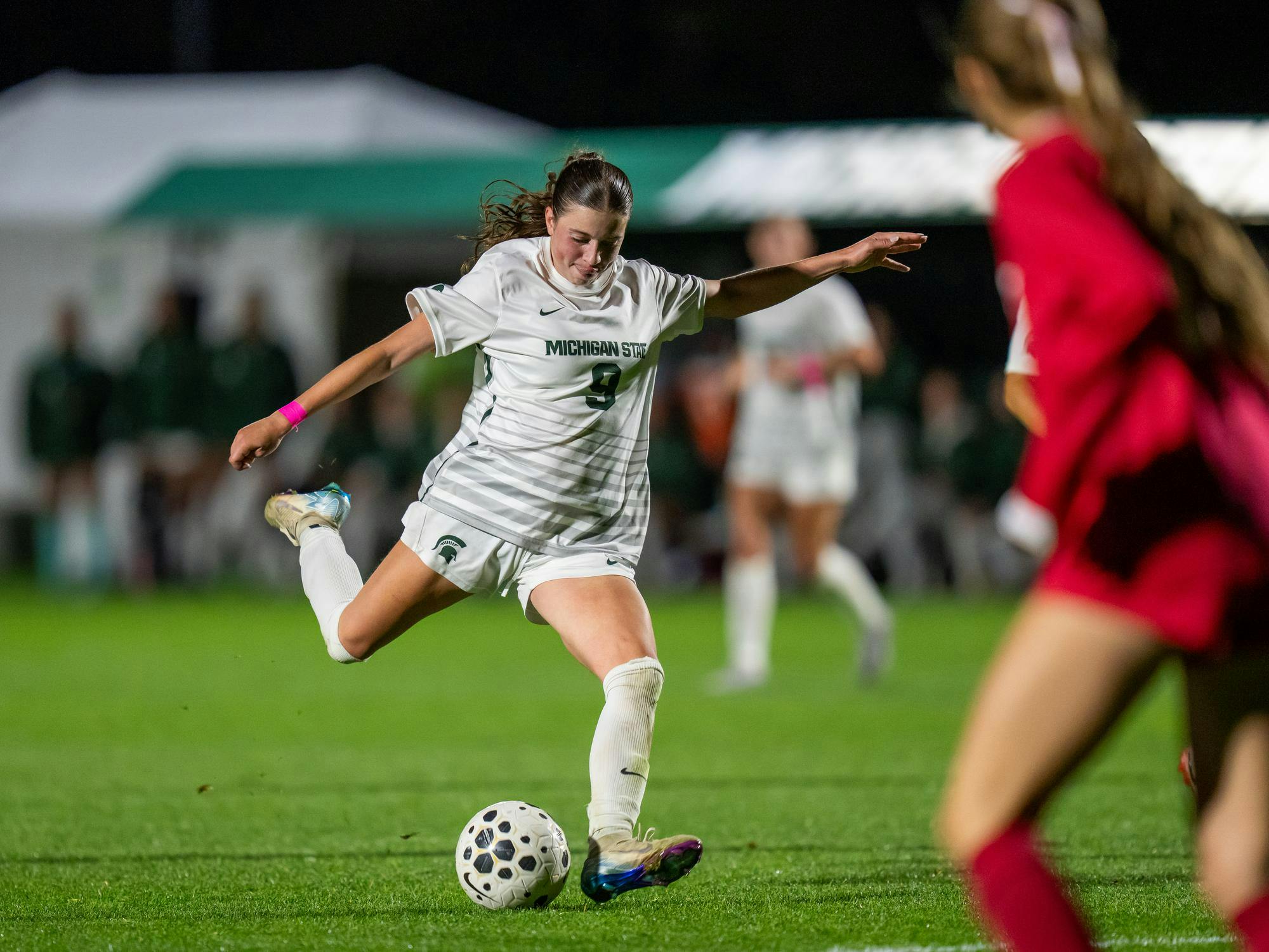 Midfield and MSU junior Kayla Briggs (9) prepares to score a goal against Indiana University at DeMartin Soccer Stadium in East Lansing, Michigan on Thursday, Oct. 16, 2025. 